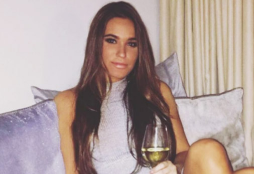 A picture of Jen with her wine.
